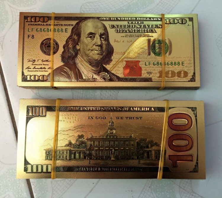Tiền 100 USD mạ vàng có thật sự tồn tại? Hãy xem hình ảnh để thấy rõ sự độc đáo và thiết kế tuyệt đẹp của những tờ tiền đặc biệt này!